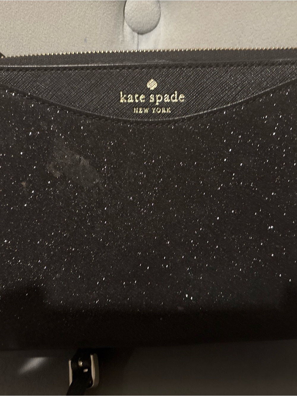 kate spade black glitter crossbody with gold logo